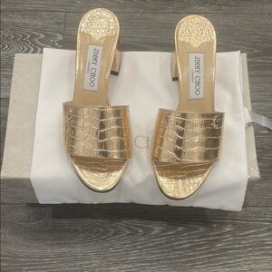 Jimmy Choo Gold Mules with a Modern Strap